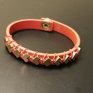 Orange studded bracelet